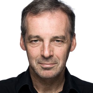 Headshot of Alan, a middle aged man with short brown hair.